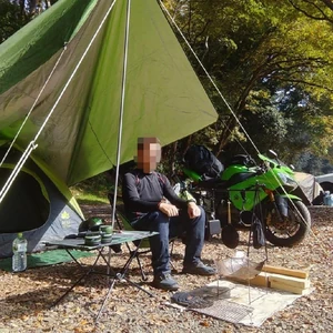 A picture of me enjoying a solo camping adventure. / Being surrounded by nature gives an instinctive sense of reassurance natural to humans.