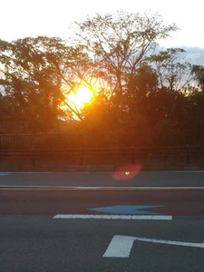 A photo of the sunset taken near my home / Because looking at the sky and sunset that I've seen since I was a child makes me feel calm.