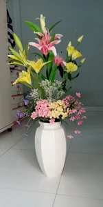 A vase of flowers to welcome the traditional Tet holiday (Vietnamese New Year) / I made this flower vase myself, and it's meant to bring the good luck I desire.