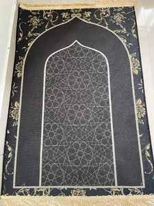 My prayer mat / Because when I am on it I feel like all my problems go away. I feel a sense of comfort and security.