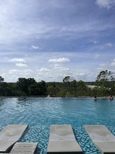 An infinity pool looking out into the sea / It makes me calm and distracts me from the world and I feel at peace