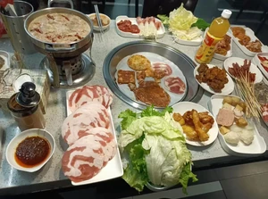 Lunch eaten with friends at a hotpot restaurant.