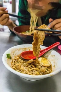 Lunch eaten with friends at a food court restaurant.