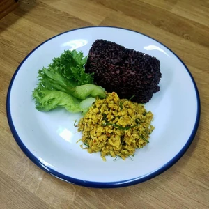 Riceberry (type of Thai brown rice) and Khua kling gai (a southern Thai dish using ground chicken meat). It was a healthy dish and low in calories. I took this photo at home and I ate by myself. I think I took this photo about noon. I prepared the meal myself.