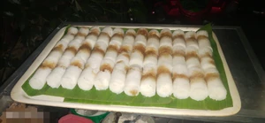 I purchased this breakfast. It's a sweet called "Kue Putu Ayu Bambu."