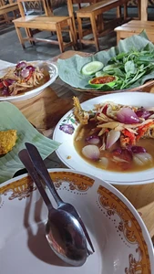 This is a photo of my lunch from three days ago taken at RM Mpok Minun in Tangerang. I ate with my friends, and we talked about various matters as we ate.