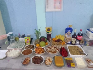 It was my family's New Year dinner/early breakfast. I took the photo in our house on 12/31/2023 Saturday before midnight of 01/01/2024. I was with my parents and sister with our dogs. While waiting for the New Year we always pray the rosary yearly and give thanks to God for all the blessings for outgoing year. We eat a lot of our Filipino dishes that we love. The food that we prepared are mostly cooked by my parents while my sister and I did the shopping of ingredients and other things we need.