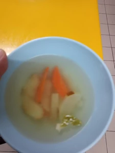 Dinner on January 25, 2024, at 6:00 P.M. I'm with friends during my break eating vegetable soup made by the company chef.