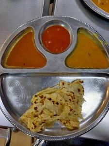 This is my dinner, today, 15 January a 8:00 P.M., at Restoran Pelita Sri Hartamas, with my whole family. I just got back from picking up my wife and buying groceries. It was a roti canai (Indian flatbread) from Restoran Pelita.