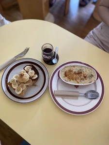 Lunch with friends at a cafe, eating baked rice and toast.